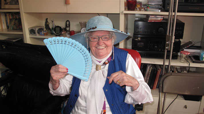 rozetta happy in blue hat
